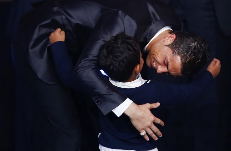 Portugal’s Cristiano Ronaldo embraces his son Cristiano Ronaldo Jr after being awarded the FIFA Ballon d’Or 2013 in Zurich