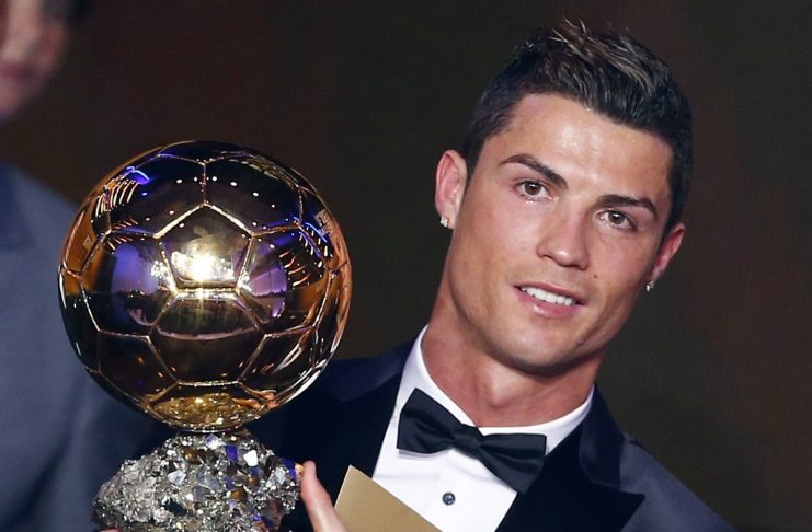 Portugal’s Cristiano Ronaldo holds his trophy after being awarded the FIFA Ballon d’Or 2013 in Zurich