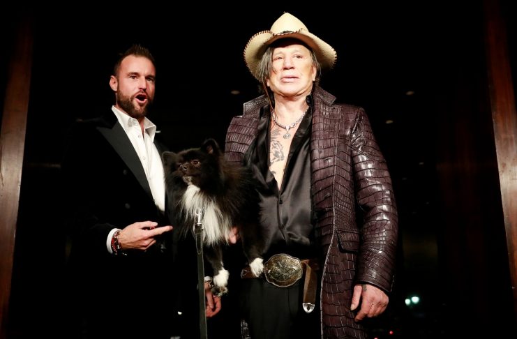 Designer Plein walks the runway with actor Rourke after presenting the Billionaire Fall/Winter 19/20 collection during New York Fashion Week