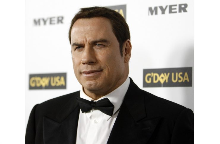 Travolta poses at the G’Day USA 2010 Los Angeles gala in Hollywood
