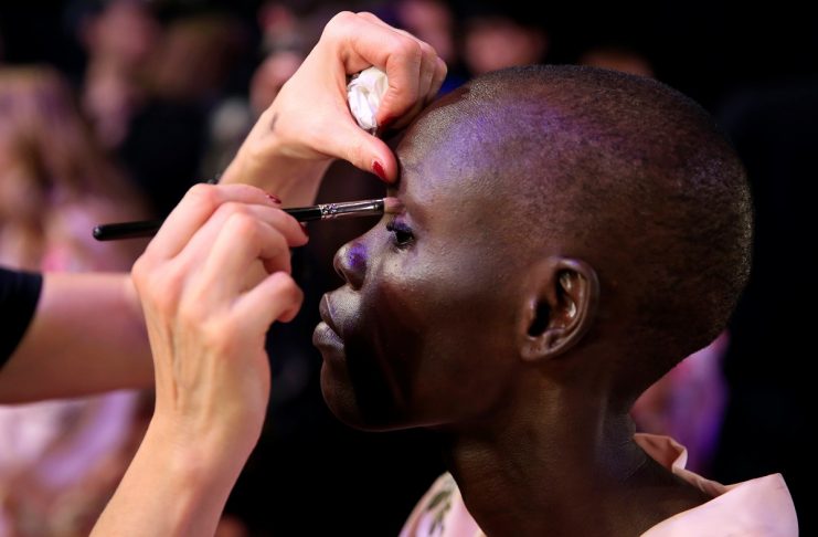 Model Grace Bol gets ready backstage before the 2017 Victoria’s Secret Fashion Show in Shanghai