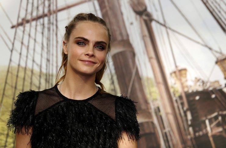 Model and actress Cara Delevigne arrives for the world premiere of “Pan” at Leicester Square in London, Britain