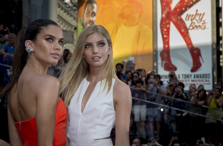 Models Niamh Adkins and Sara Sampaio pose on the red carpet for a screening of the film “Mission Impossible: Rogue Nation” in New York
