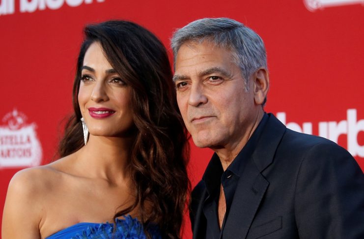Director George Clooney and his wife Amal attend the premiere for “Suburbicon” in Los Angeles, California