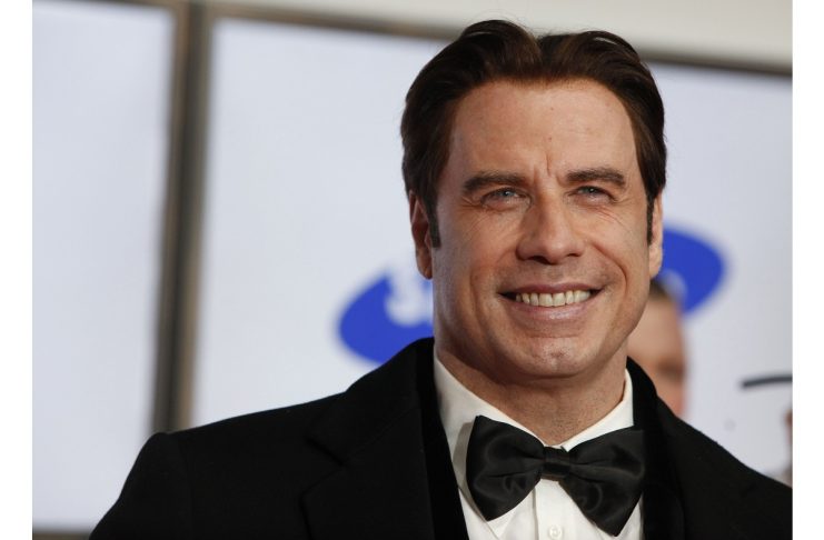 U.S. actor Travolta arrives for the Golden Camera awards in Berlin