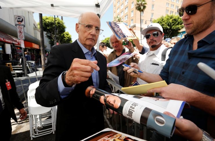Actor Tambor signs autographs after unveiling his star on the Hollywood Walk of Fame in Los Angeles