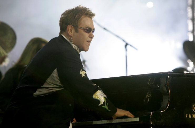 Elton John performs at the Concert for Diana at Wembley Stadium in London