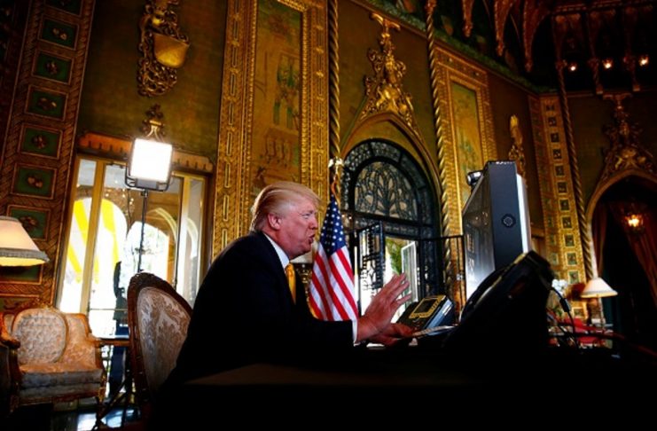 U.S. President Donald Trump speaks via teleconference with troops from Mar-a-Lago estate in Palm Beach