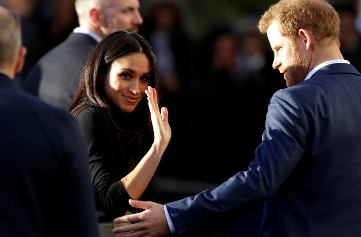 Meghan Markle, accompanied by her fiancee Britain’s Prince Harry, visits the Nottingham Academy school in Nottingham