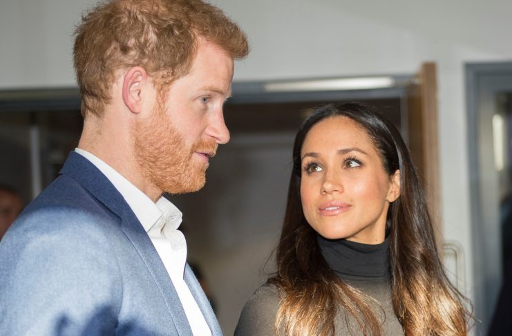 Britain’s Prince Harry and his fiancee Meghan Markle visit the Nottingham Academy school in Nottingham