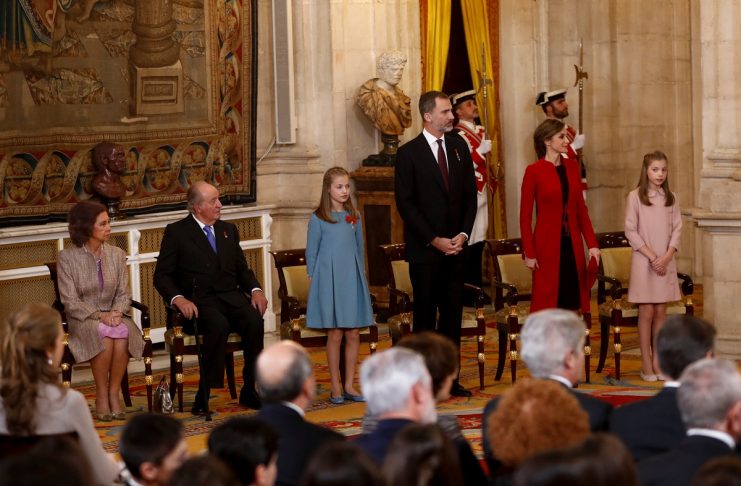 Spain’s King Felipe and Queen Letizia stand with their daughters Princess Leonor  and Princess Sofia during a  ceremony at the Royal Palace in Madrid