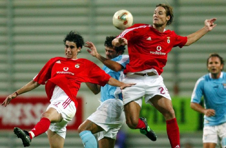BENFICA SOCCER PLAYERS FEHER AND TEAM MATE TIAGO ARE CHALLENGED BY
LAZIO DEJAN STANKOVIC.