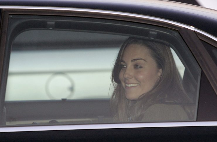 Kate Middleton, girlfriend of Britain’s Prince William, is driven away as she leaves the annual Cheltenham Festival horse racing meeting in western England