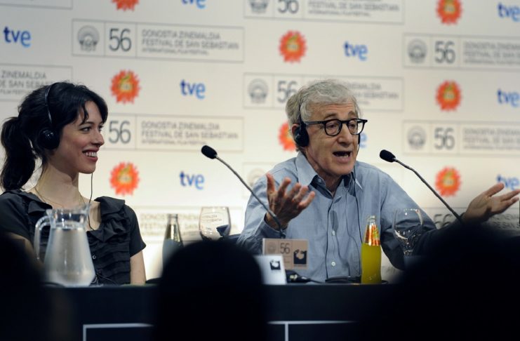 U.S. film director Allen, Spanish actor Bardem and British actress Hall smile during news conference at 56th San Sebastian Film Festival