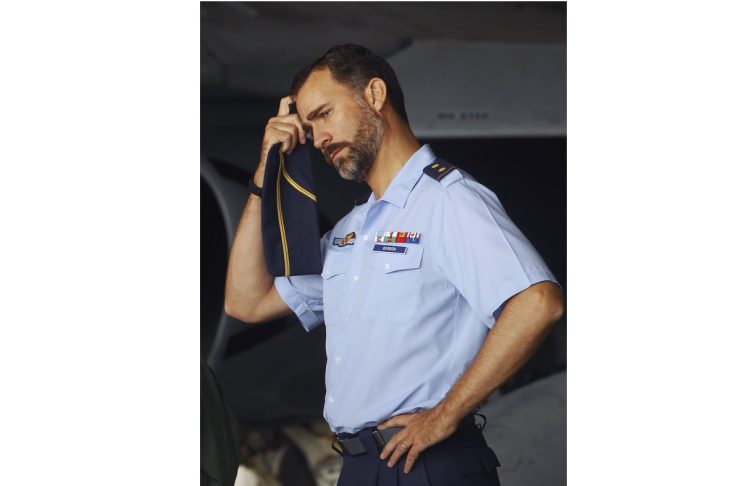 Spain’s Crown Prince Felipe reacts during his visit to the Torrejon de Ardoz military airbase