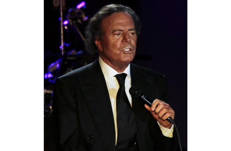 Spanish singer Julio Iglesias performs during a concert at the Conmebol Convention Center in Luque