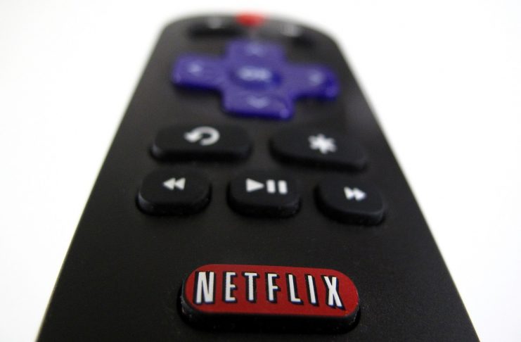 The Netflix logo is pictured on a television remote in this illustration photograph taken in Encinitas California