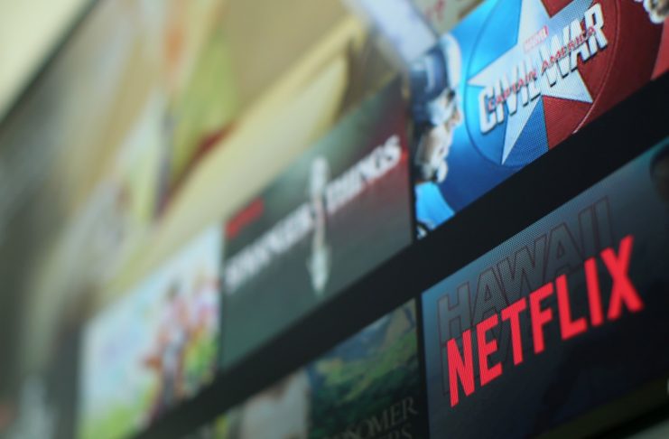 The Netflix logo is pictured on a tevevison in this illustration photograph taken in Encinitas, California