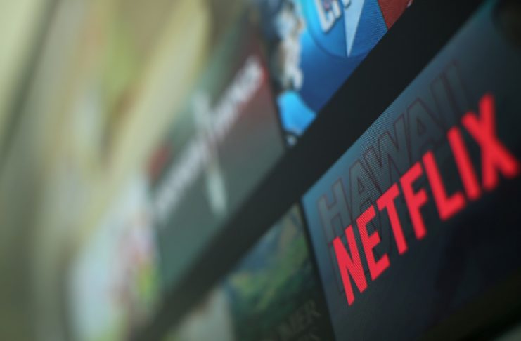 The Netflix logo is pictured on a television in this illustration photograph taken in Encinitas California