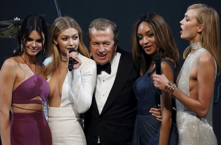Kendall Jenner, Gigi Hadid, Mario Testino, Jourdan Dunn and Karlie Kloss conduct an auction during the amfAR’s Cinema Against AIDS 2015 event during the 68th Cannes Film Festival in Antibes