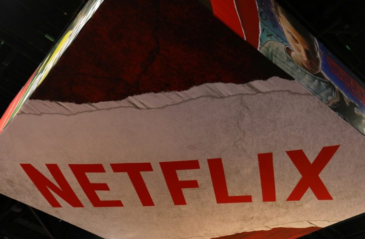 The Netflix logo is shown above their booth at Comic Con International in San Diego,
