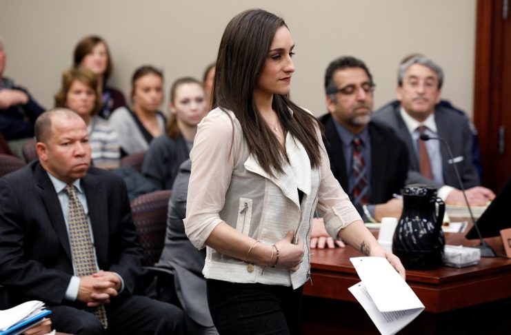 Victim and former gymnast Jordyn Wieber walks to the podium to speak at the sentencing hearing for Larry Nassar, a former team USA Gymnastics doctor who pleaded guilty in November 2017 to sexual assault charges, in Lansing