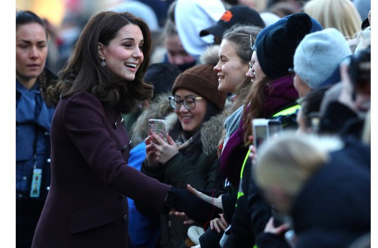 Britain’s Catherine, Duchess of Cambridge, greets well-wishers as she arrives at Hartvig Nissen School in Oslo