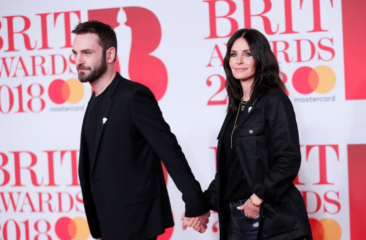 Courtney Cox and Johnny McDaid arrive at the Brit Awards at the O2 Arena in London