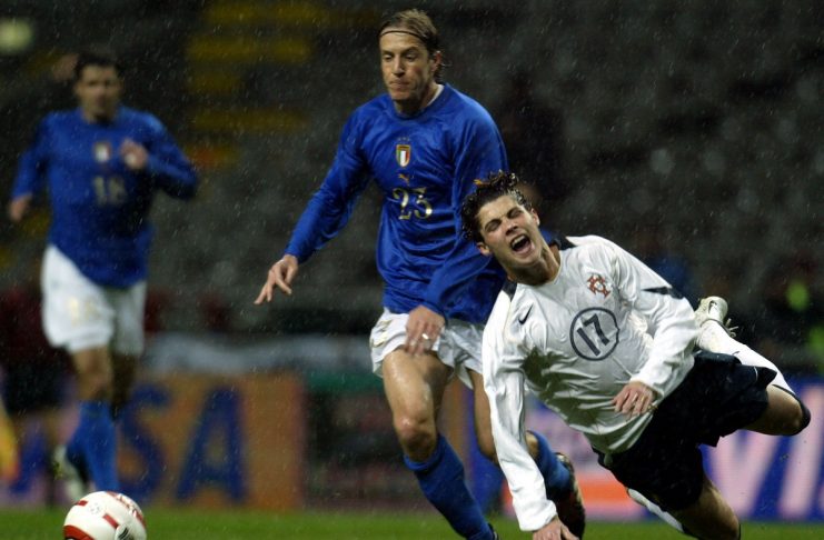 PORTUGAL’S RONALDO INJURED AFTER CHALLENGE BY ITALIAN AMBROSINI DURING THEIR FRIENDLY MATCH IN BRAGA.