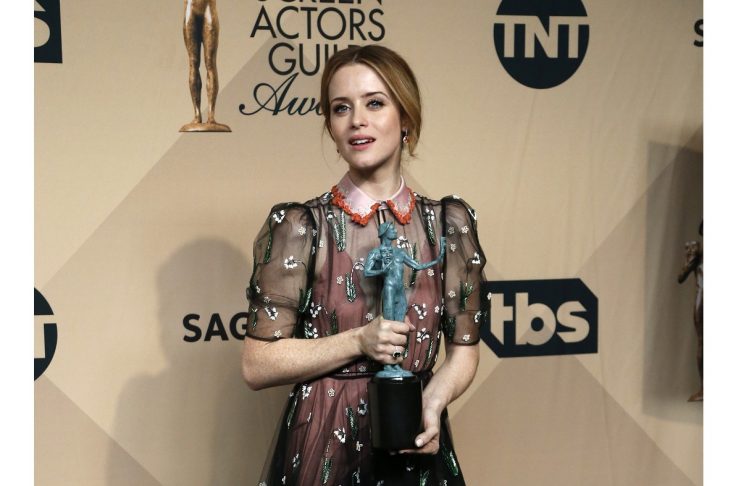 Actress Claire Foy poses with the award she won for Outstanding Performance by a Female Actor in a Drama Series for her role in “The Crown” backstage at the 23rd Screen Actors Guild Awards in Los Angeles