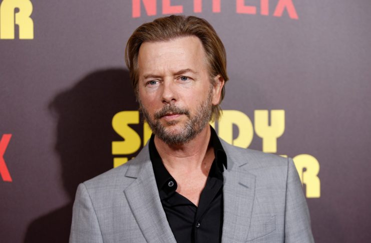Actor David Spade poses at a premiere for the Netflix original film “Sandy Wexler” in Los Angeles