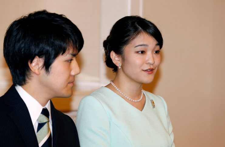 Princess Mako, the elder daughter of Prince Akishino and Princess Kiko, speaks to media with her fiancee Kei Komuro, a university friend of Princess Mako, during a press conference to announce their engagement at Akasaka East Residence in Tokyo