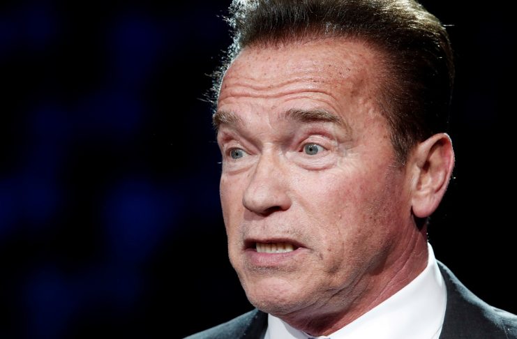 R20 Founder and former California state governor Arnold Schwarzenegger delivers a speech during the One Planet Summit at the Seine Musicale center in Boulogne-Billancourt