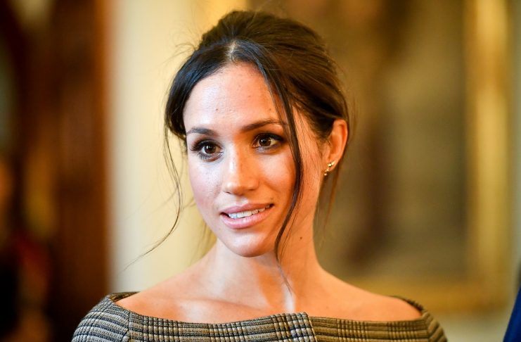 Meghan Markle chats with people inside the Drawing Room during a visit to Cardiff Castle in Cardiff