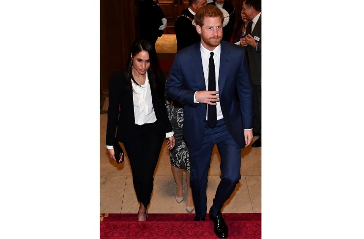 Britain’s Prince Harry and his fiancee Meghan Markle arrive to attend the annual Endeavour Fund Awards at Goldsmiths’ Hall in London