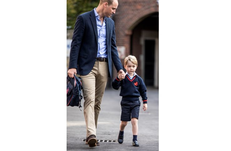 Britain’s Prince William accompanies his son Prince George on his first day of school at Thomas’s school in Battersea, London