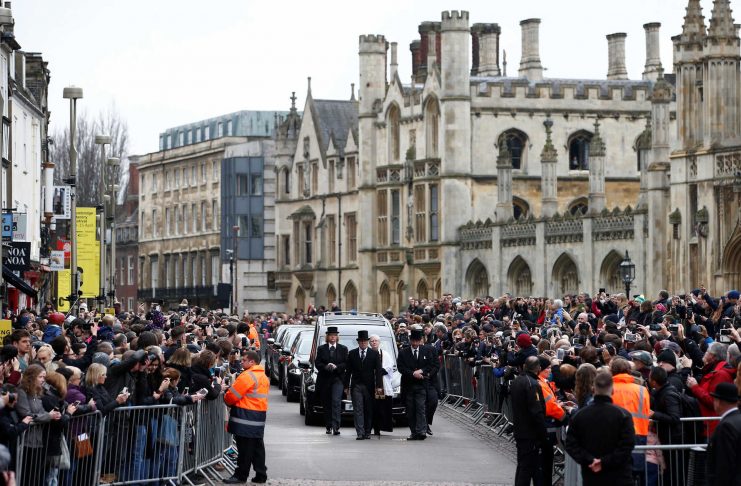 The funeral cortege arrives at Great St Marys Church, where the funeral of theoretical physicist Prof Stephen Hawking is being held, in Cambridge