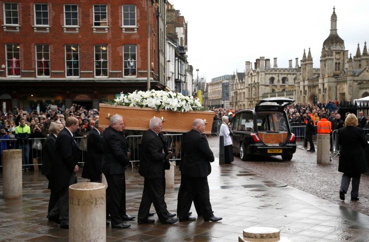 Pallbearers carry the coffin out of Great St Marys Church at the end of the funeral of theoretical physicist Prof Stephen Hawking, in Cambridge