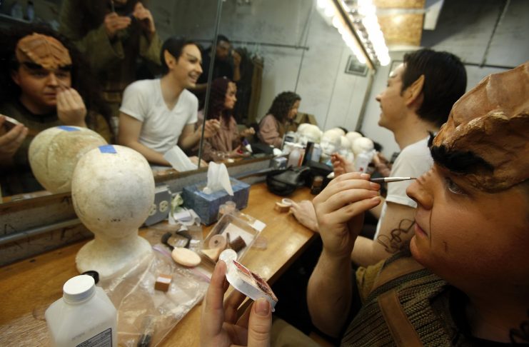 Performers put on their make-up backstage as they prepare for a performance in “A Klingon Christmas Carol” in Chicago