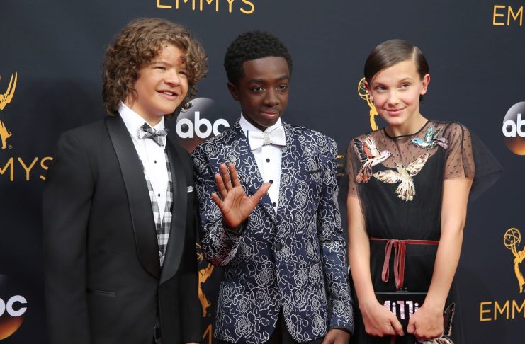 Actors Gaten Matarazzo, Caleb McLaughlin and Millie Bobby Brown from the Netflix series “Stranger Things” arrive at the 68th Primetime Emmy Awards in Los Angeles, California