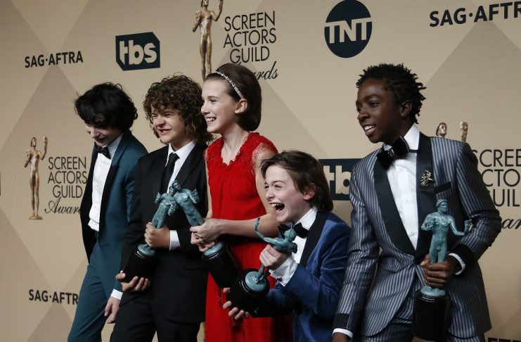 The cast of “Stranger Things” poses with the awards they won for Outstanding Performance by an Ensemble in a Drama Series backstage at the 23rd Screen Actors Guild Awards in Los Angeles