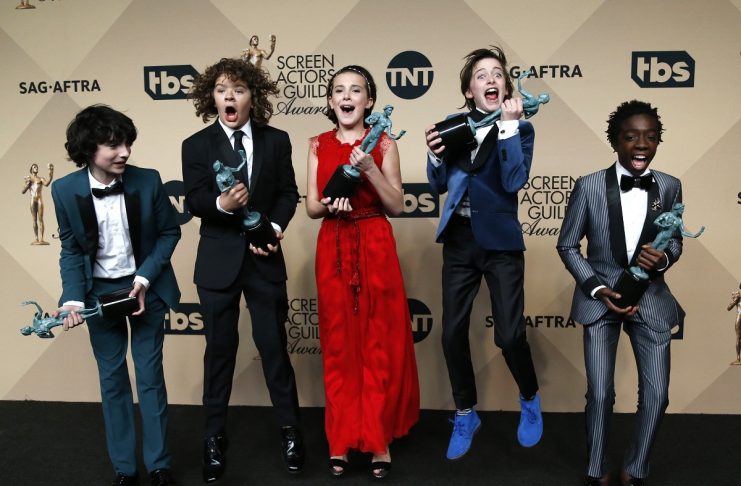 The cast of “Stranger Things” poses with the awards they won for Outstanding Performance by an Ensemble in a Drama Series backstage at the 23rd Screen Actors Guild Awards in Los Angeles