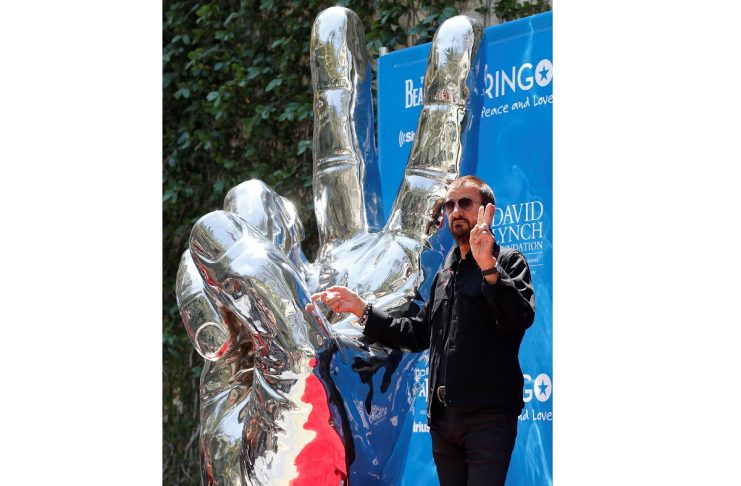 Musician Starr poses during a “Peace & Love” event to celebrate Starr’s 77th birthday in Los Angeles