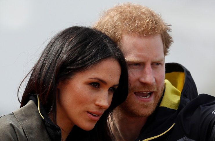 Britain’s Prince Harry, Patron of the Invictus Games Foundation, and Meghan Markle watch athletes at the team trials for the Invictus Games Sydney 2018 at the University of Bath Sports Training Village in Bath