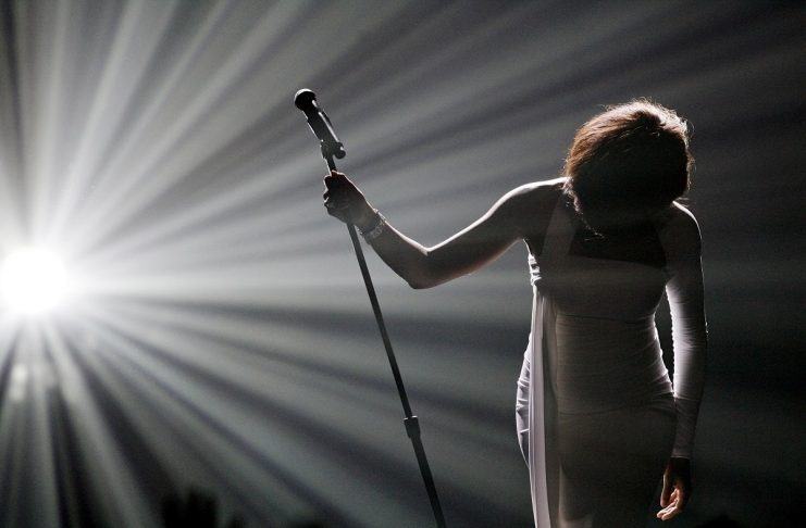 Whitney Houston bows after performing “I Didn’t Know My Own Strength” at the 2009 American Music Awards in Los Angeles
