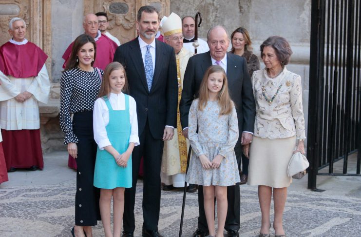 Members of the Spanish Royal Family Queen Letizia, King Felipe, King Juan Carlos, Queen Sofia, and Infantas Leonor and Sofia pose for the media after arriving for an Easter Sunday mass at Palma de Mallorca’s Cathedral on the Spanish island of Mallorca