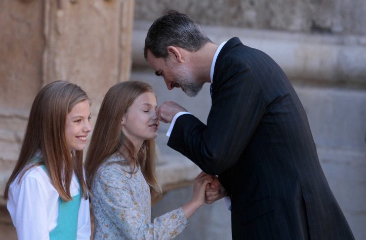 Members of the Spanish Royal Family King Felipe, and Infantas Leonor and Sofia pose for the media after attending an Easter Sunday mass at Palma de Mallorca’s Cathedral on the Spanish island of Mallorca