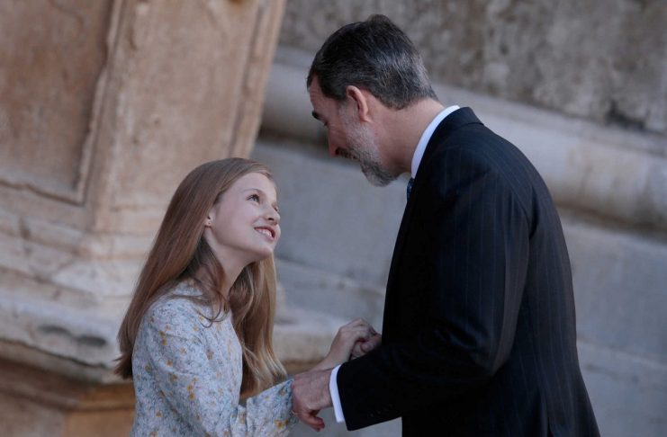 Spanish Royal Family King Felipe and daughter Infanta Leonor gesture after attending an Easter Sunday mass at Palma de Mallorca’s Cathedral on the Spanish island of Mallorca