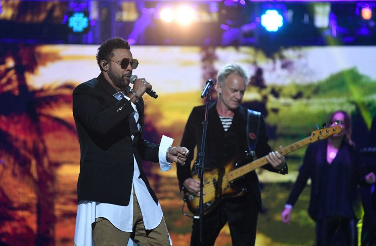 Shaggy and Sting perform during a special concert “The Queen’s Birthday Party” to celebrate the 92nd birthday of Britain’s Queen Elizabeth at the Royal Albert Hall in London