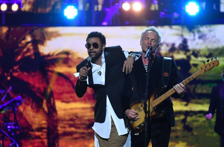 Shaggy and Sting perform during a special concert “The Queen’s Birthday Party” to celebrate the 92nd birthday of Britain’s Queen Elizabeth at the Royal Albert Hall in London